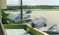 Ground equipment and airplane on tarmac
